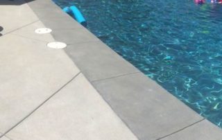 Concrete pool deck resurfacing
