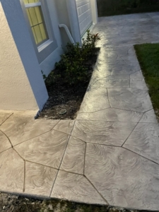 stamped concrete walkway gray flagstone