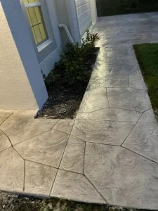 stamped concrete walkway gray flagstone