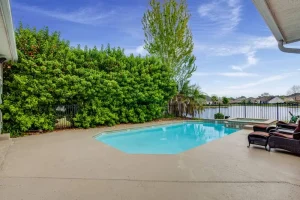 pool deck in natural pebble