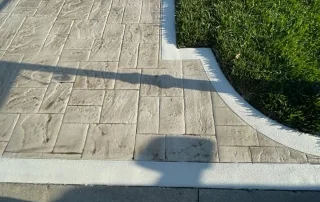 Stamped concrete driveway classic brick pattern