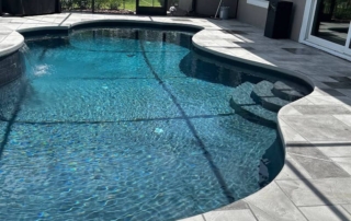 geometric design resurfaced pool deck