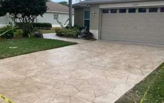 newly finish stamped concrete driveway