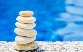 pool deck material white pebble stone