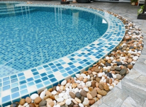 swimming pool deck pebble stone design