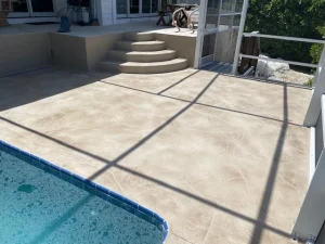 Upgraded pool deck finish for luxurious swimming experience Upgraded pool deck finish for luxurious swimming experience