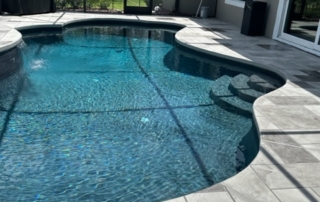 dark and light gray pool deck resurfacing