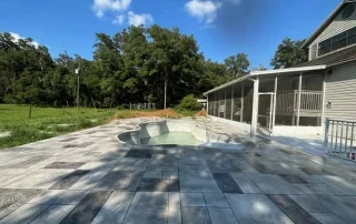 unfinished pool deck and pool resurfacing