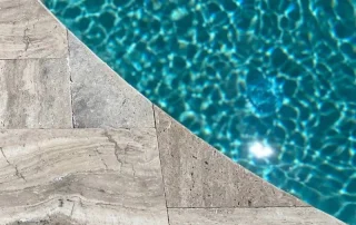 rustic grey travertine coping