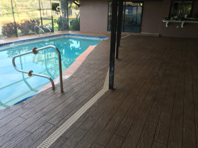 wood plank stamped concrete pool deck resurfacing