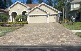 Driveway With Pavers and Pressure Washing in Action