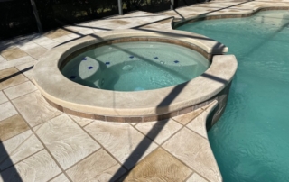 Inviting Spa and Pool Area with Pacific Tile Decorative Concrete