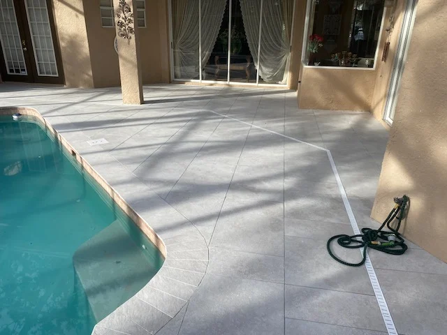 Sleek Porcelain Pavers Installation Around Pool