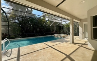 Sunny Poolside Concrete Deck