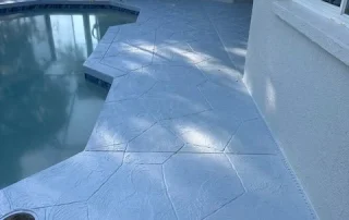grey stamped pool deck resurfacing