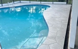 pool with concrete patio