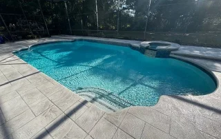 stamped concrete pool deck sunlight